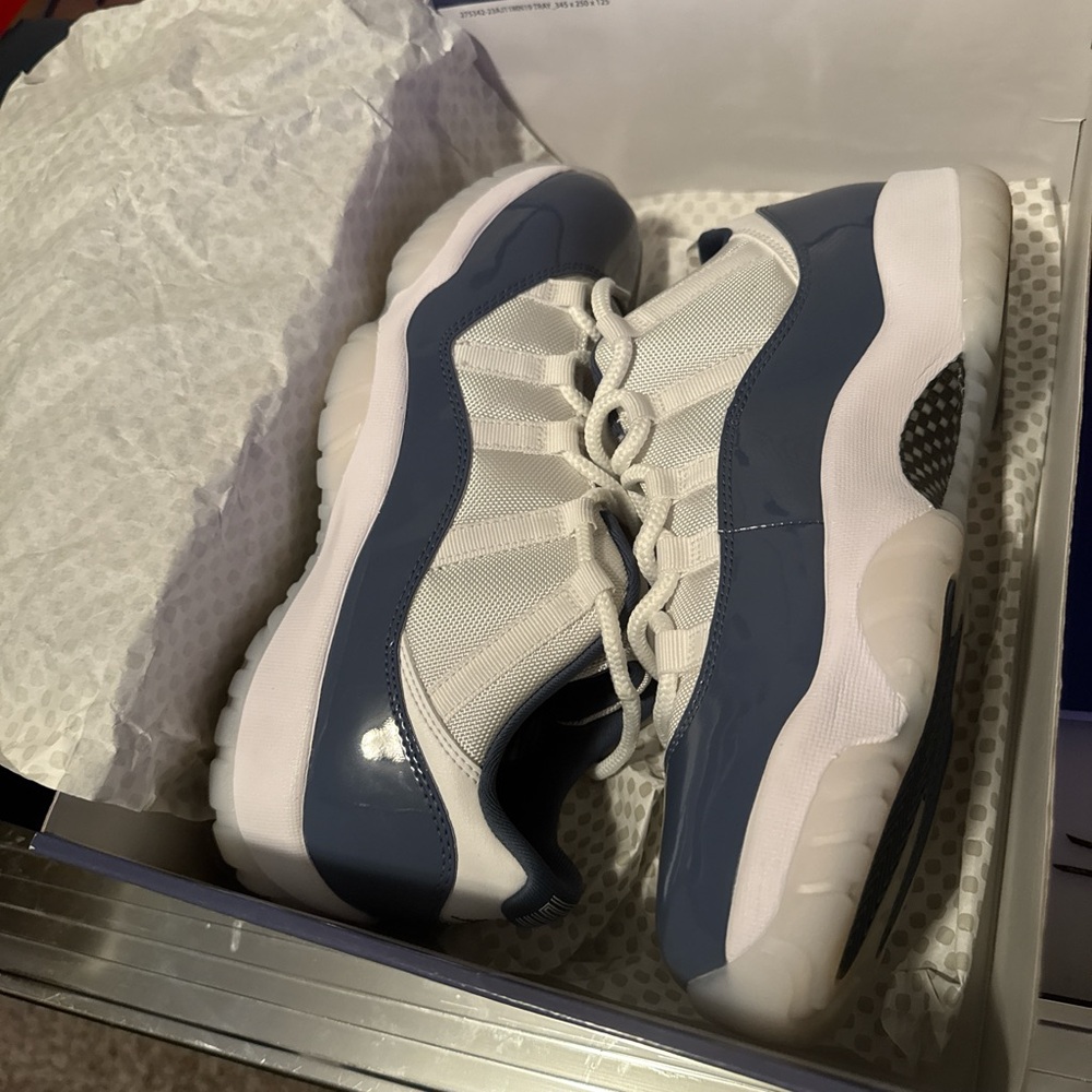 Jordan 11s retro lows 
White/midnight navy